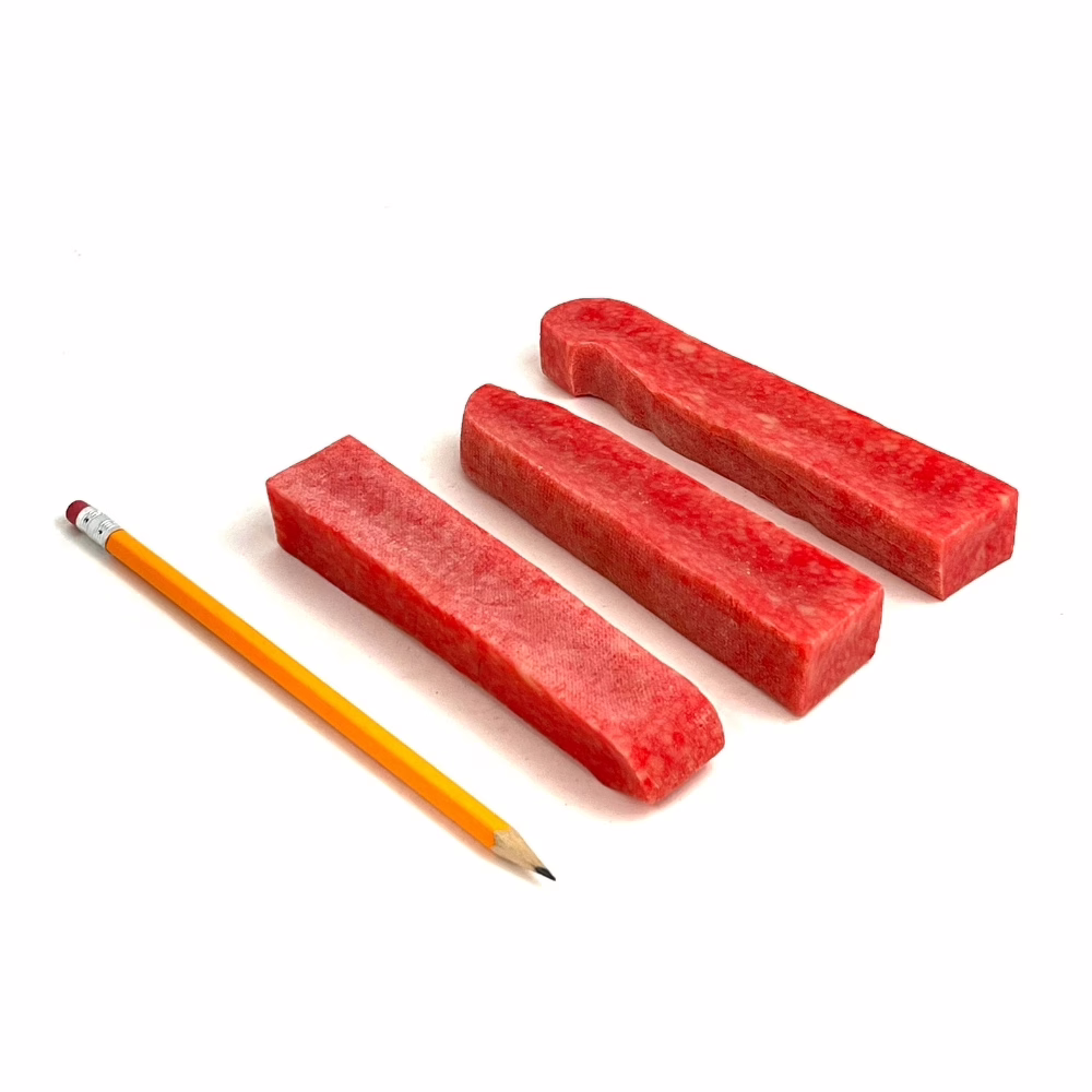 yak-chews-strawberry-91-110g-pencil Strawberry Yak Chews next to a pencil for comparison